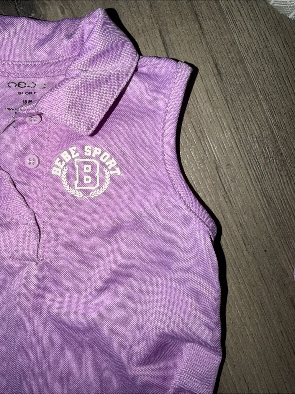 bebe sleeveless polo